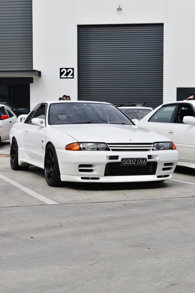 White R32 outside Mitch’s Garage, photographed by Pitworks